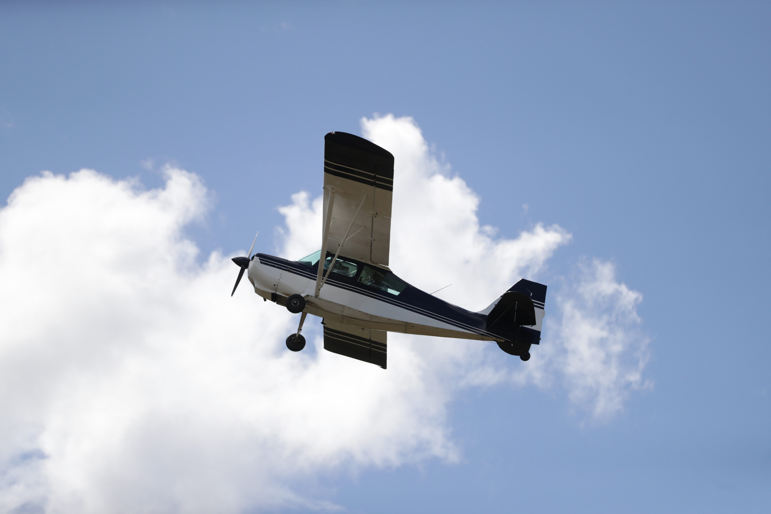 VFR plane amid blue sky