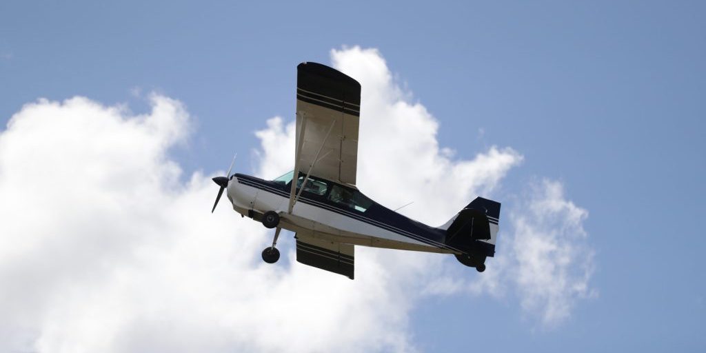 VFR plane amid blue sky